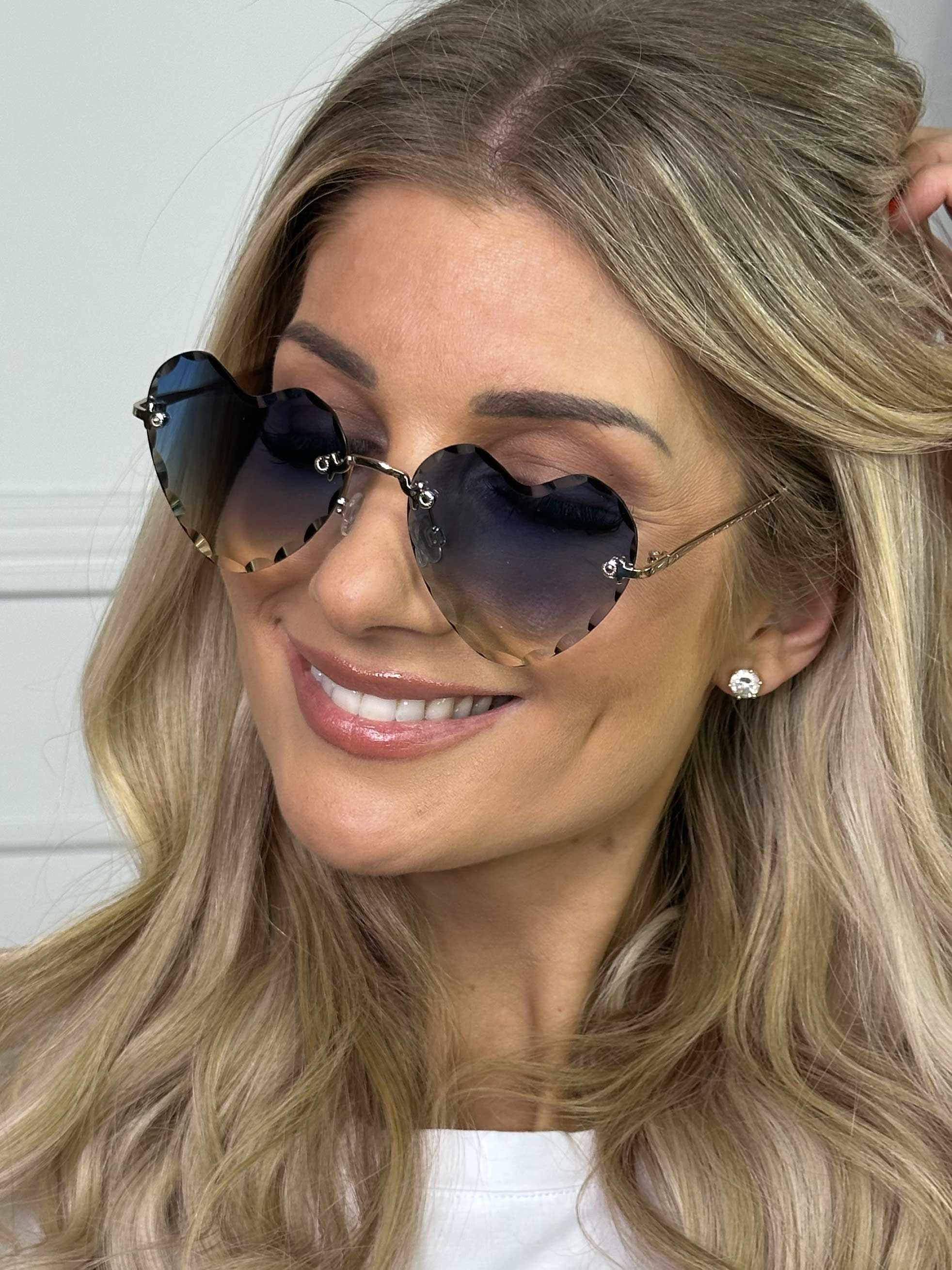 Emmas - Solglasögon med hjärtformad färgad lins